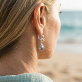 Precious Silver 18k "Dancing Couple" Dolphin Leverback Earring — worn on model (blonde, view 4)