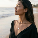 Precious Silver 28mm "Jumping Single" Dolphin Pendant — worn on model (brunette, view 2)