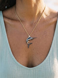 PRECIOUS SILVER/14KY (BLACK & YELLOW) 40MM BLUE MARLIN PENDANT W/2 DIA. 0.02ct T/W — close-up on model