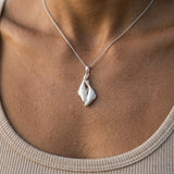 Precious Silver 20mm Seal Pendant "Dancing Couple" with 4 Diamonds — worn on model (brunette, view 4)