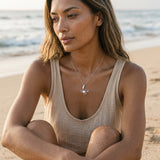 Precious Silver 22mm Crab Pendant with 2 Diamonds, Water Pearl and Tanzanite — worn on model (brunette, view 1)
