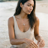Precious Silver 22mm Crab Pendant with 2 Diamonds, Water Pearl and Tanzanite — worn on model (brunette, view 2)