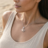 Precious Silver 22mm Crab Pendant with 2 Diamonds, Water Pearl and Tanzanite — worn on model (brunette, view 3)