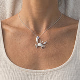 Precious Silver 22mm Crab Pendant with 2 Diamonds and Tanzanite — worn on model (blonde, view 4)