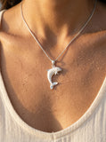 Precious Silver 20mm "Jumping Single" Dolphin Pendant — worn on model (brunette, view 4)
