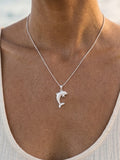Precious Silver 20mm "Jumping Single" Dolphin Pendant — close-up on model