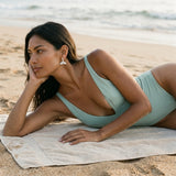 Precious Silver 20mm "Whale Tail" Earrings — worn on model (brunette, view 1)