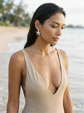 Precious Silver 18mm Starfish Earring with 2 White Sapphire — worn on model (brunette, view 2)