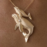 14k 36mm Whale Pendant "First Breath" with 2 Diamonds — worn on model (brunette, view 2)
