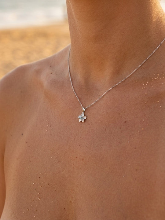 8mm 14k Plumeria Pendant with 0.02 carats blue diamond