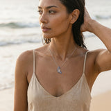 14k 2/tone Single Butterfly (Blue Morpho) Pendant with 48 Blue Sapphires — worn on model (brunette, view 2)