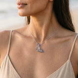 14k 2/tone Single Butterfly (Blue Morpho) Pendant with 48 Blue Sapphires — worn on model (brunette, view 4)