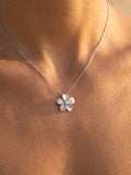 14k 15mm Plumeria Slide with 0.04 carats diamond — close-up on model