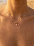 14ky "Maui" Pendant with 0.03 Carat Diamond (for WAILEA) — close-up on model