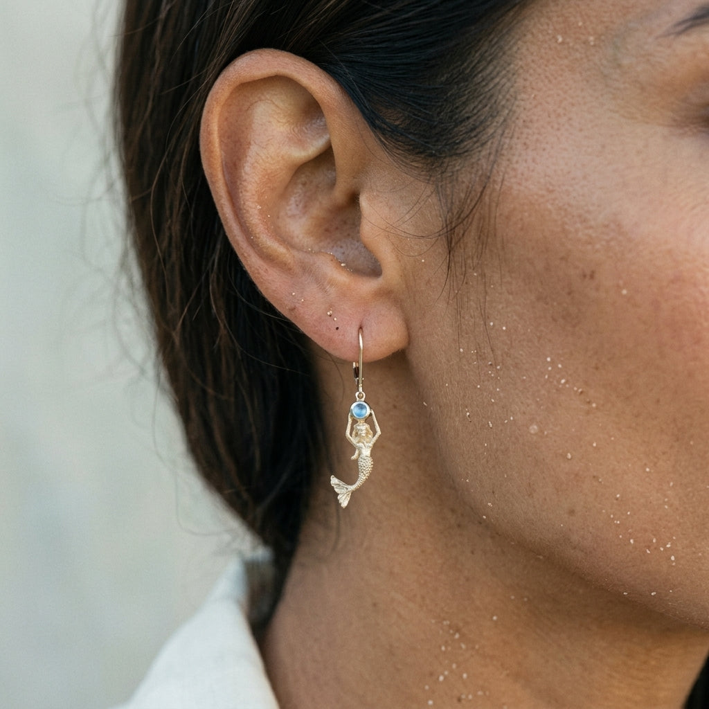 14ky Mermaid Earrings with 2 Blue Topaz .24ct, 2 Moonstones .19ct with Dangle Leverback — worn on model (brunette, view 4)