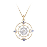 14K 2/TONE "COMPASS ROSE" PENDANT WITH 17 DIAMONDS .07ct, 4 TANZANITES .25ct