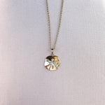 Radiant Sand Dollar Pendant Necklace