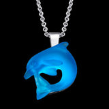Colgante de delfines de oro blanco de 14k